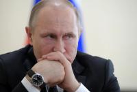 Путин согласился на миротворческую миссию на Донбассе в обмен на засекречивание части "Кремлевского доклада", - эксперт