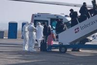 Колона з евакуйованими з Уханя залишила харківський аеропорт