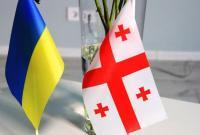 Осужденные в Грузии украинские моряки вернулись в Украину