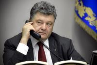 Порошенко обсудил с Путиным освобождение украинских политзаключенных